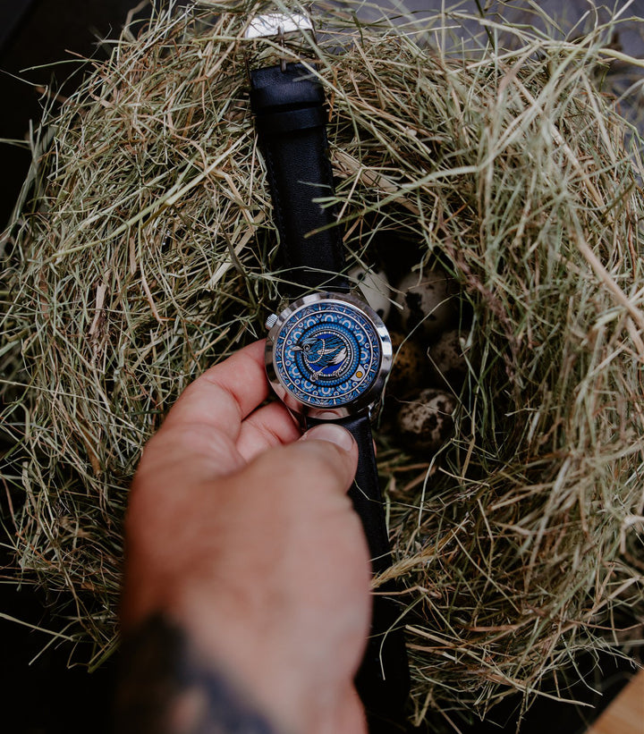 The Silent Thief watch in hand