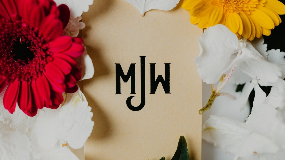 MJW logo surrounded by flowers