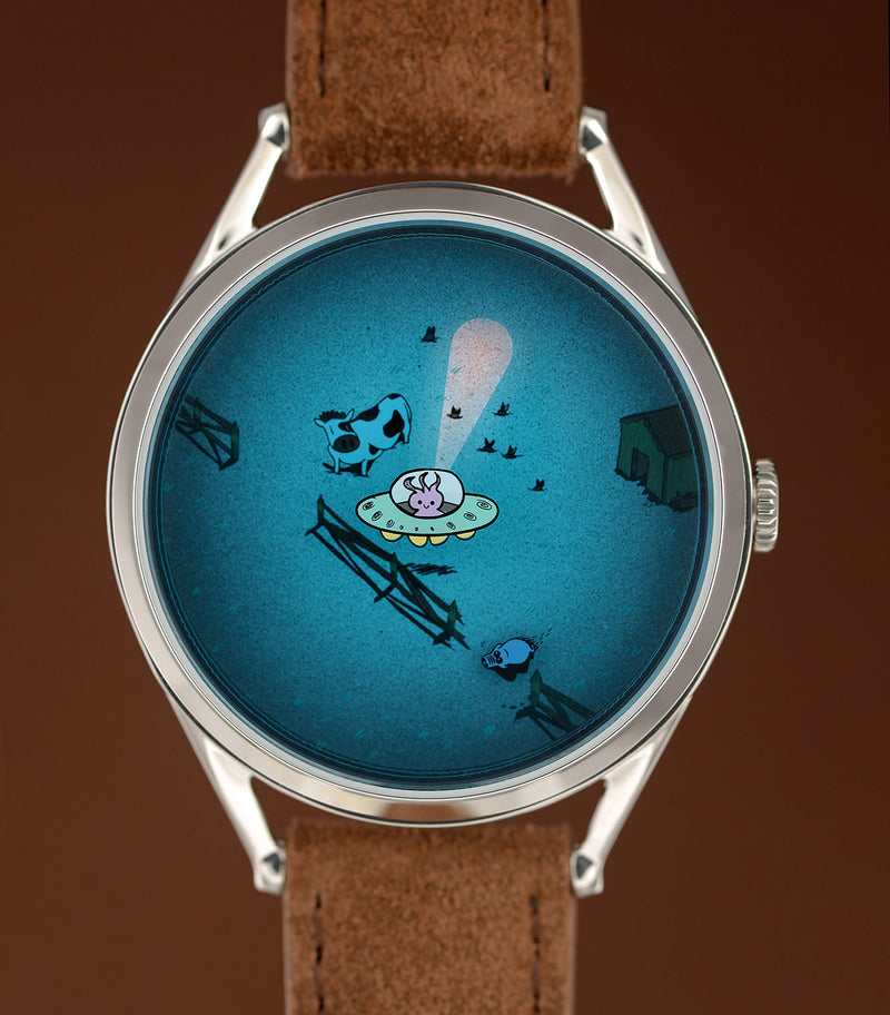 Beam me up! mechanical watch on brown background