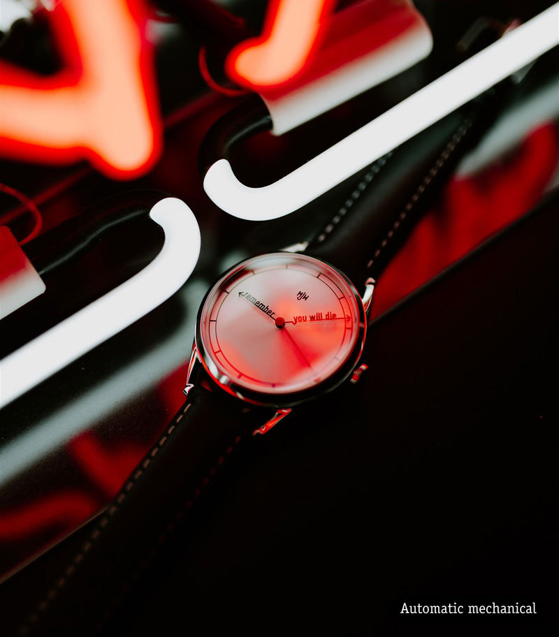 The Accurate Mechanical watch with neon light background