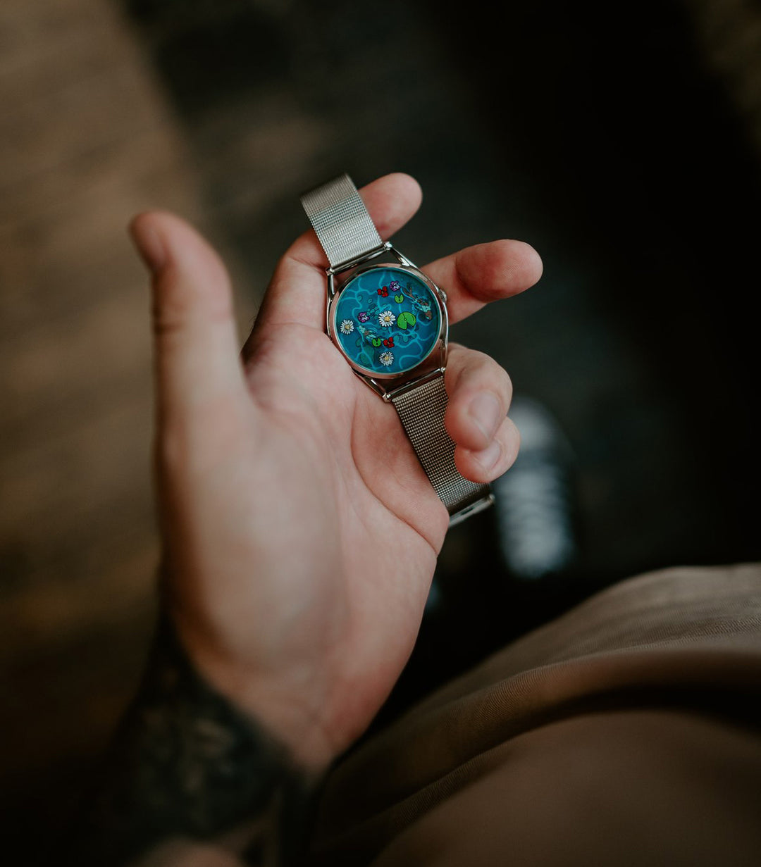 Ophelia pond watch in hand