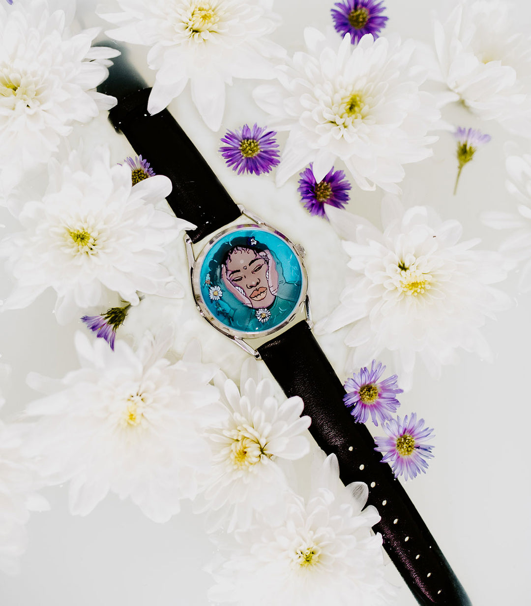 Ophelia watch in milk bath surrounded by flowers 2